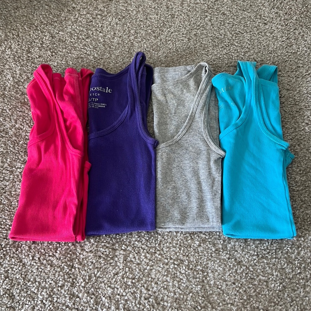 Set of 4; Aeropostale brand woman’s tank tops; fitted long length size XS